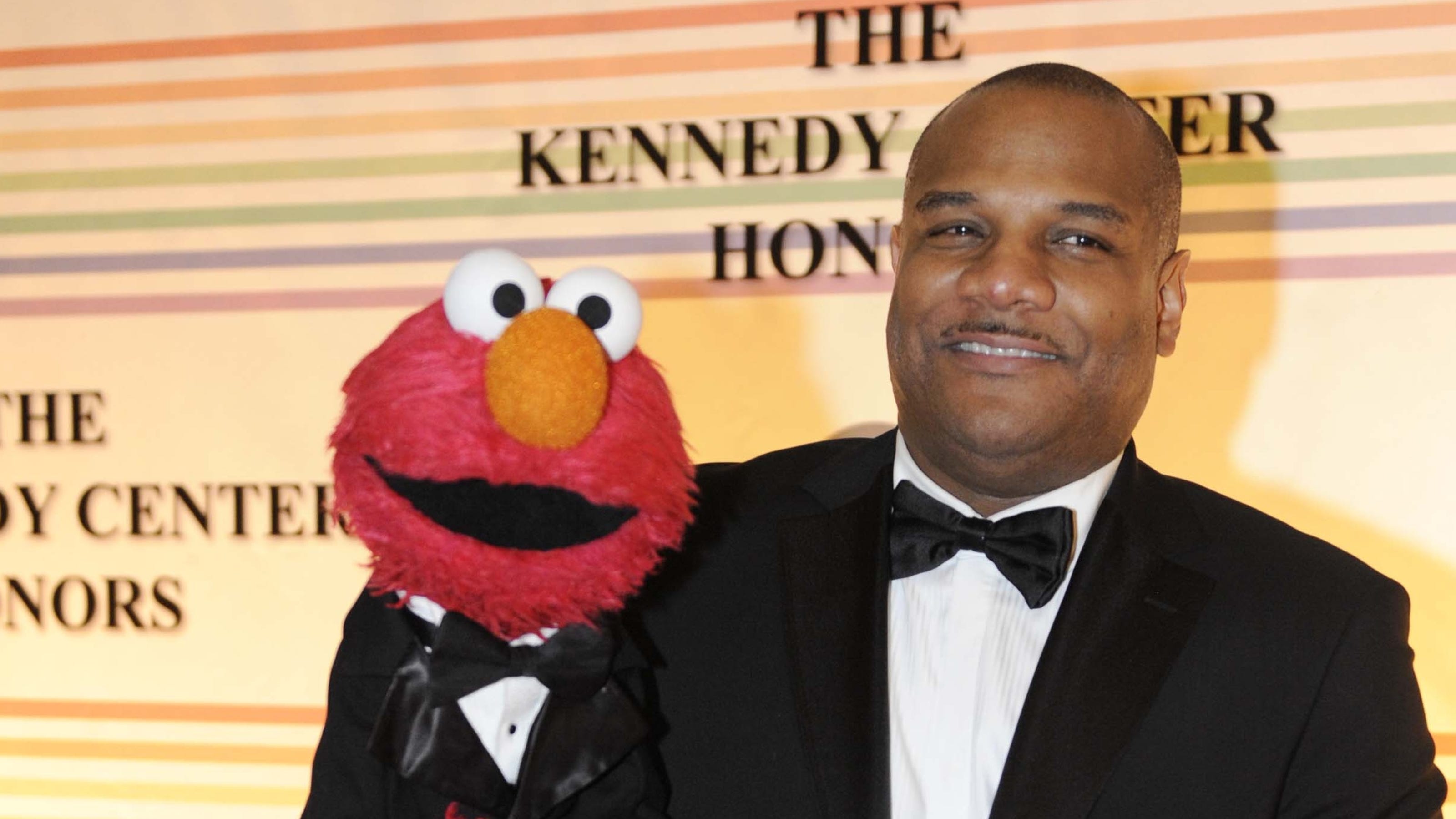 Elmo puppeteer takes leave amid underage sex charges