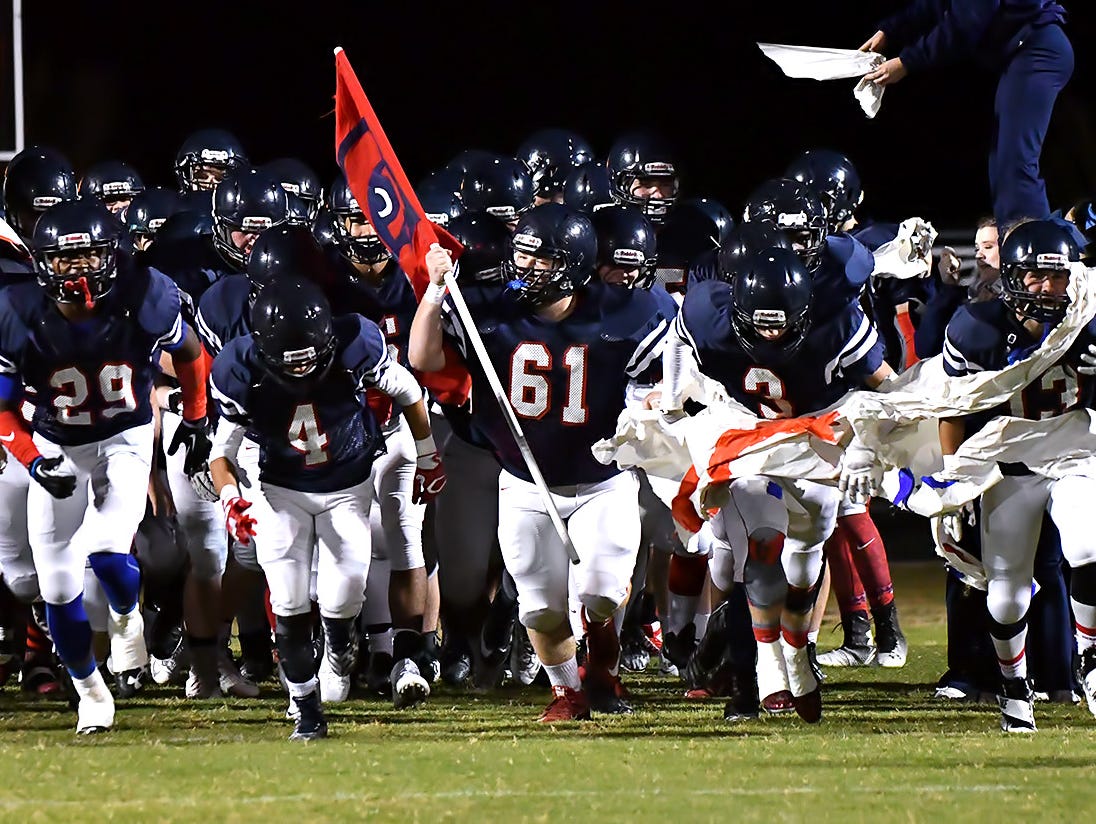 Creek Wood charges onto the field against Hillwood.