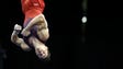 Chris Brooks competes in the floor exercise during