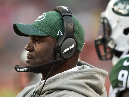 FILE - In this Oct. 30, 2016, file photo, New York Jets coach Todd Bowles stands on the sideline during the team's NFL football game against the Cleveland Browns in Cleveland. Bowles has been hospitalized with what the team says is an 