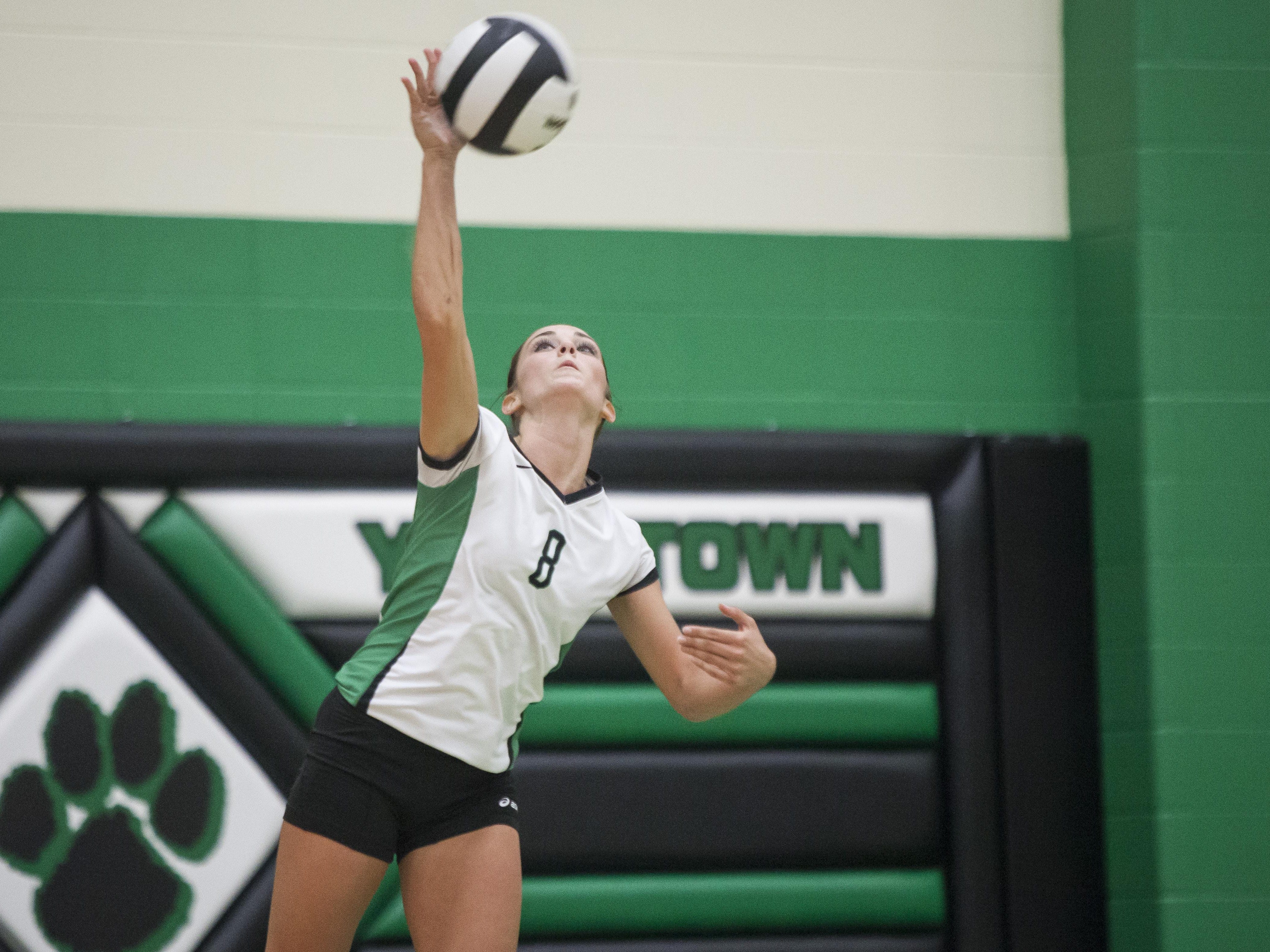 Yorktown's Jade York serves during Monday's home match against Wapahani. The Tigers swept the Raiders.