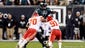 Kansas City Chiefs defensive end Mike DeVito (70) and linebacker Tamba Hali (91) hit Philadelphia Eagles quarterback Michael Vick (7) during the first quarter at Lincoln Financial Field.