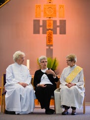 The Rev. Bernie Sykora, a womanpriest, from left, Rose