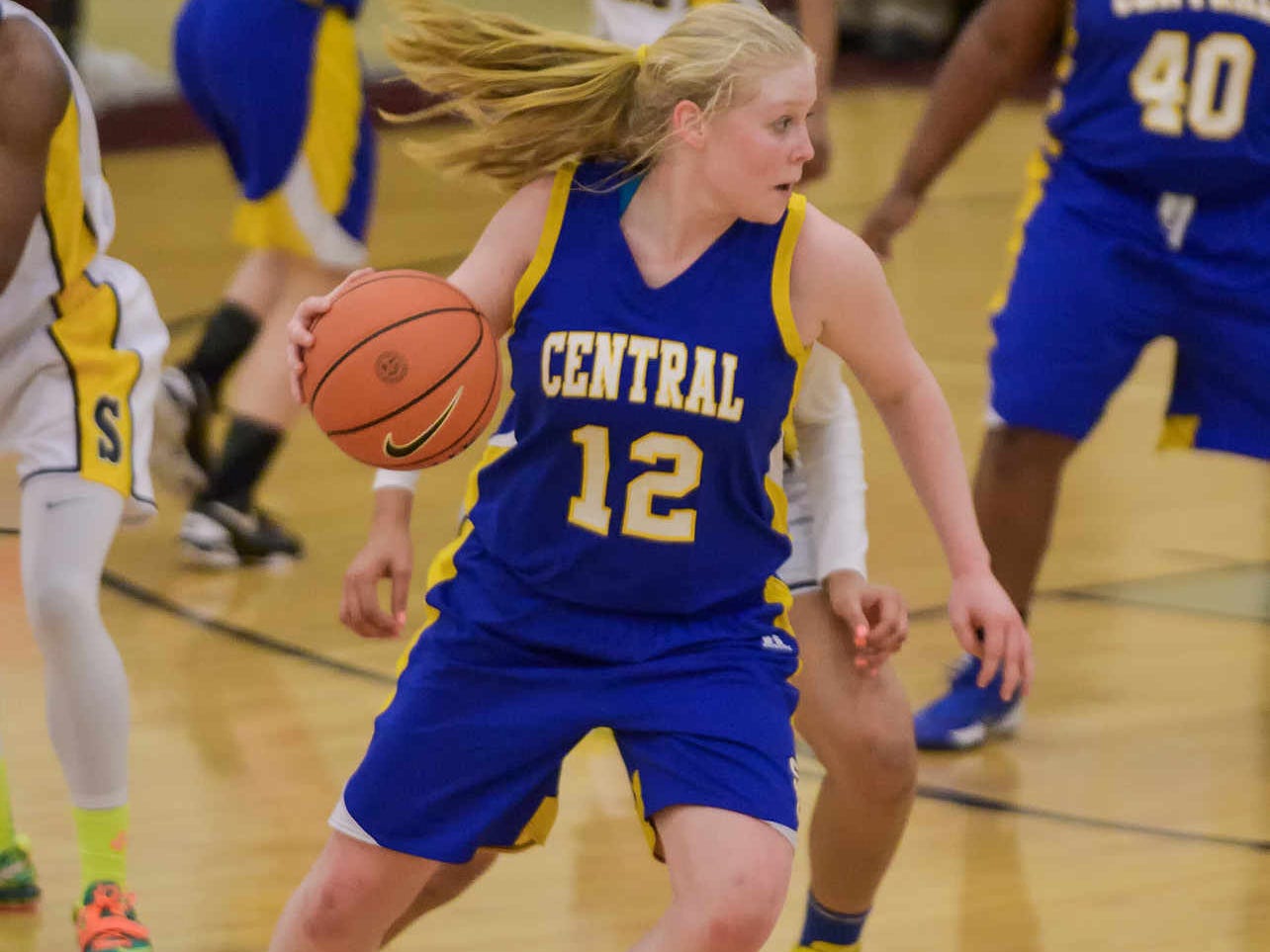Emily Truitt (#12, Sussex Central) takes the ball down the court. DIAA girls basketball quarterfinal between Sanford and Sussex Central. DOUG CURRAN/SPECIAL TO THE NEWS JOURNAL