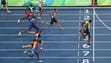 Usain Bolt (JAM) wins gold in the men’s 200-meter final.