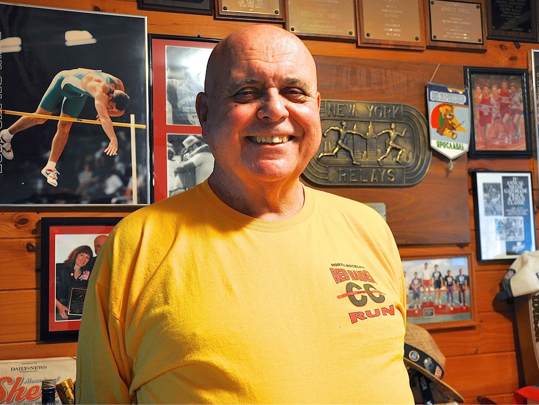 Gene Dall, North Rockland track and field coach, in his Tomkins Cove home, which is filled with years of memories -- much of it displayed on the walls..jpg