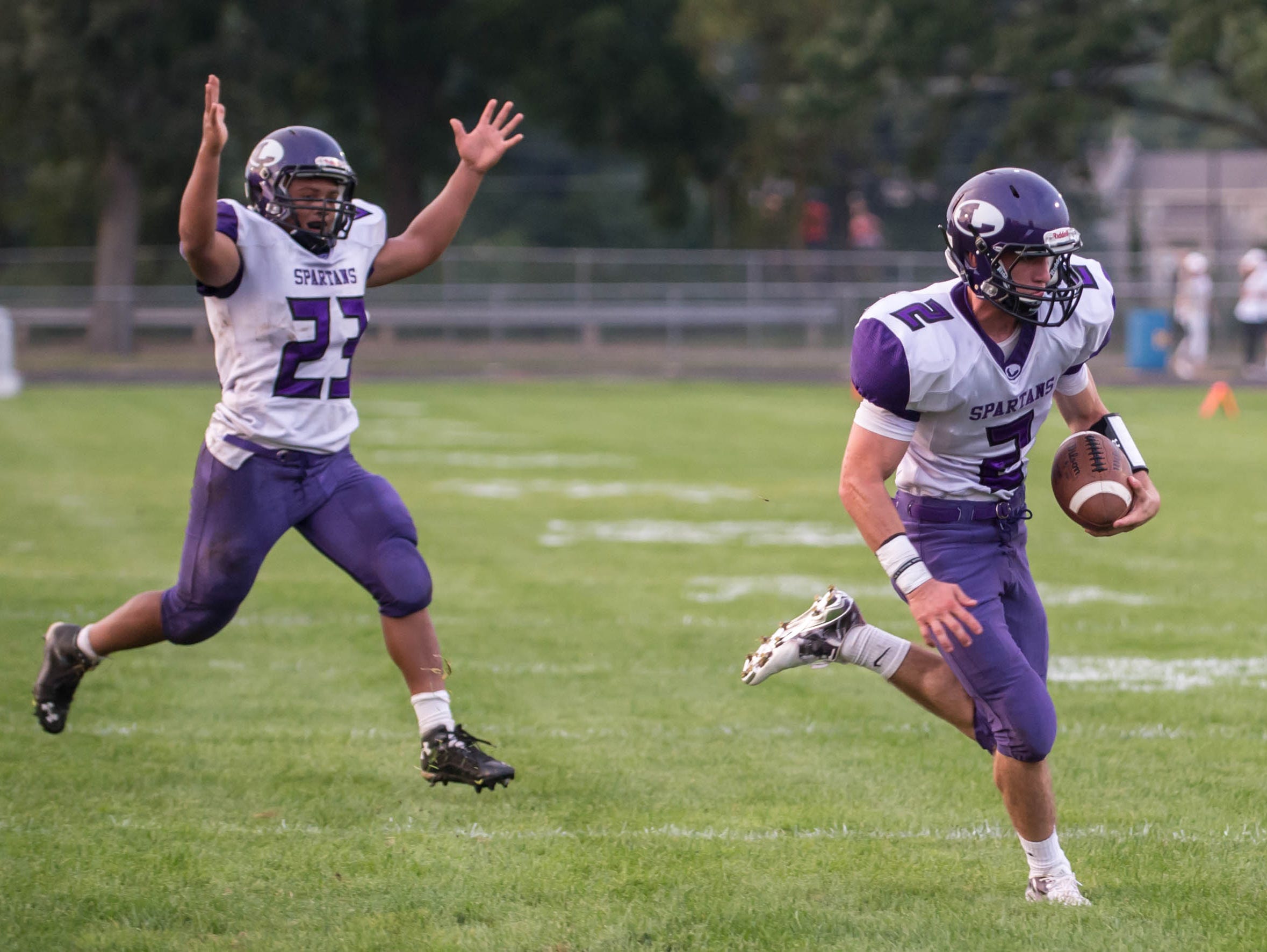 Lakeview's Josiah Kitchen (2) nears the goal line as CJ Foster (23) signals for the touchdown during Friday's game against Mattawan.