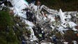 Rescuers search for survivors from the wreckage of