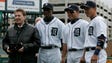 Detroit Tigers owner Mike Ilitch stands with Tigers