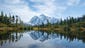 A crystal clear reflection of Mt. Shuksan is seen in