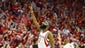 Houston Rockets guard James Harden (13) points up after