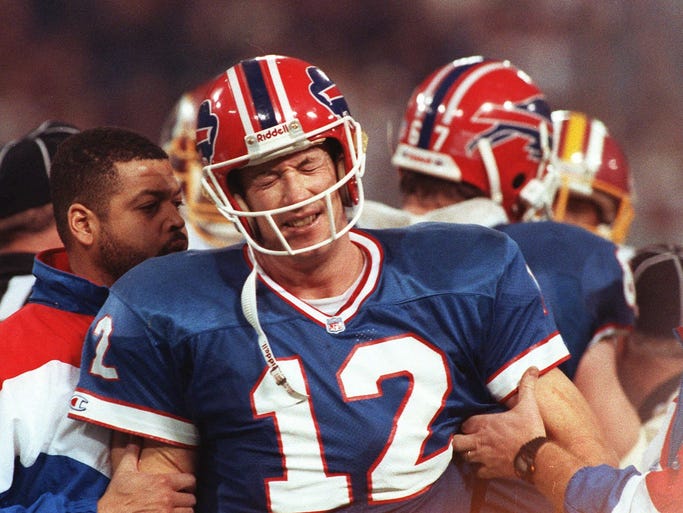 Buffalo Bills quarterback Jim Kelly grimaces during the 37-24 loss to the Washington Redskins in Super Bowl XXVI in Minneapolis.