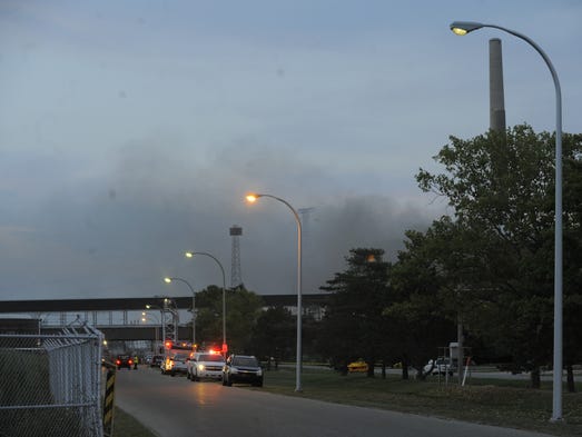 Smoke rises, Thursday Aug. 11, 2016, at a DTE Energy
