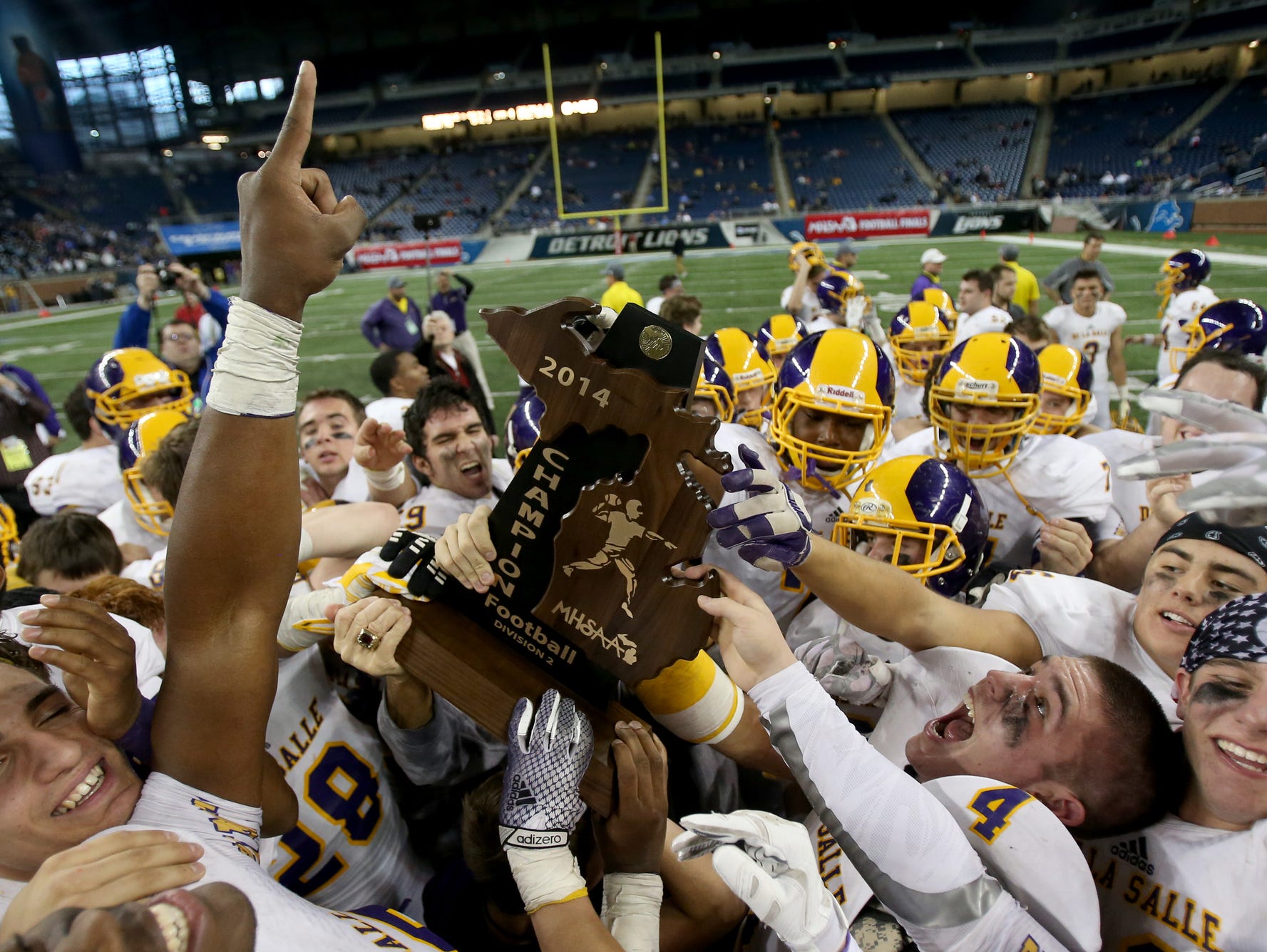 Michigan high school football playoffs with game times! USA TODAY