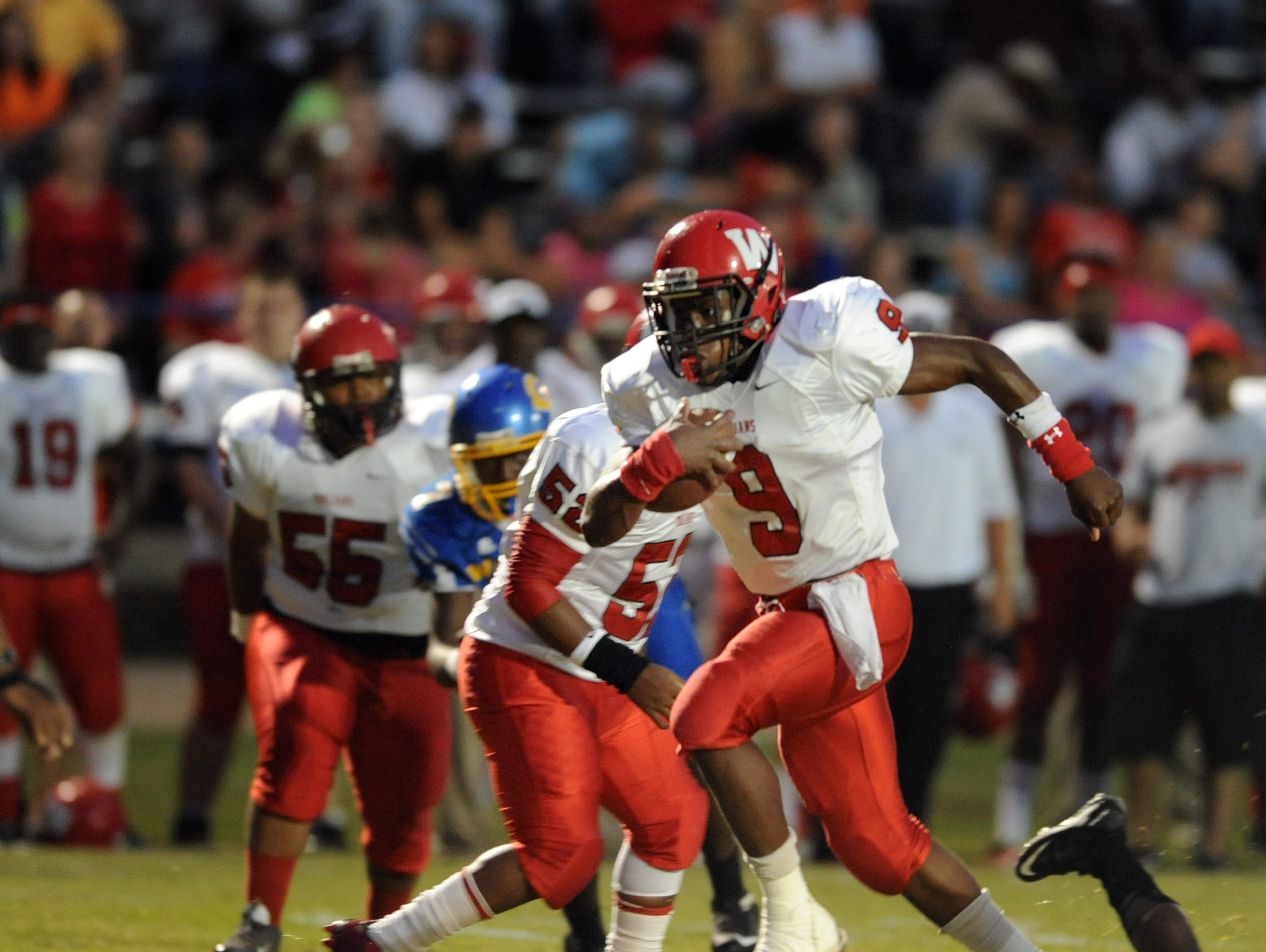 West Marion player Josh Miller (9) breaks away from the Columbia defense earlier this season. West Marion faces Collins for the Class 3A South State Championship on Friday.