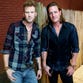 In this Sept. 24, 2014 photo, members of Florida Georgia, Line Brian Kelley, left, and Tyler Hubbard pose for a photo in Nashville, Tenn., to promote their latest album, "Anything Goes."