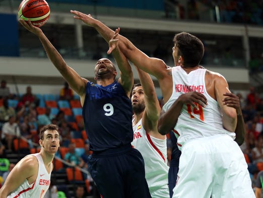 Tony Parker of France shoots the ball against Guillermo