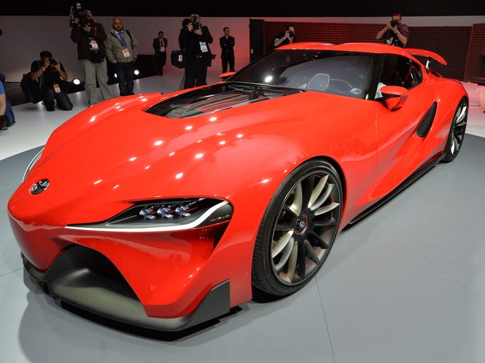 Members of the media get a look at the Toyota FT-1 concept car