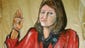 Regina Holliday is shown in a red jacket in a painting