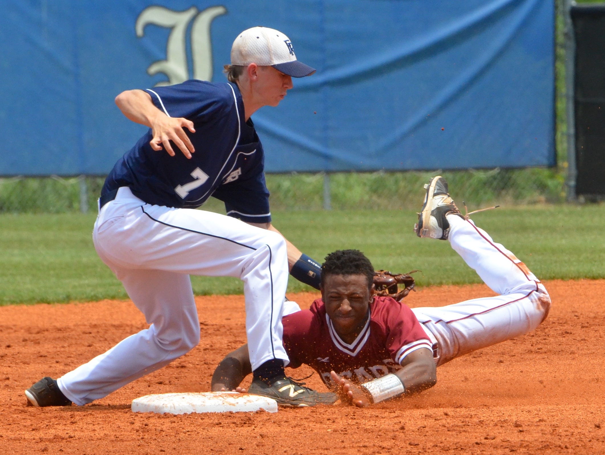 FRA shortstop Ponder Thurman applies the tag to Ezell-Harding’s Marcus Watson for an out during the second inning of Wednesday’s Division II-A winners bracket final at La Vergne High School.