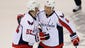 Washington Capitals defenseman Steve Oleksy, right, congratulates defenseman Mike Green on his shootout-winning goal in the 4-3 victory.