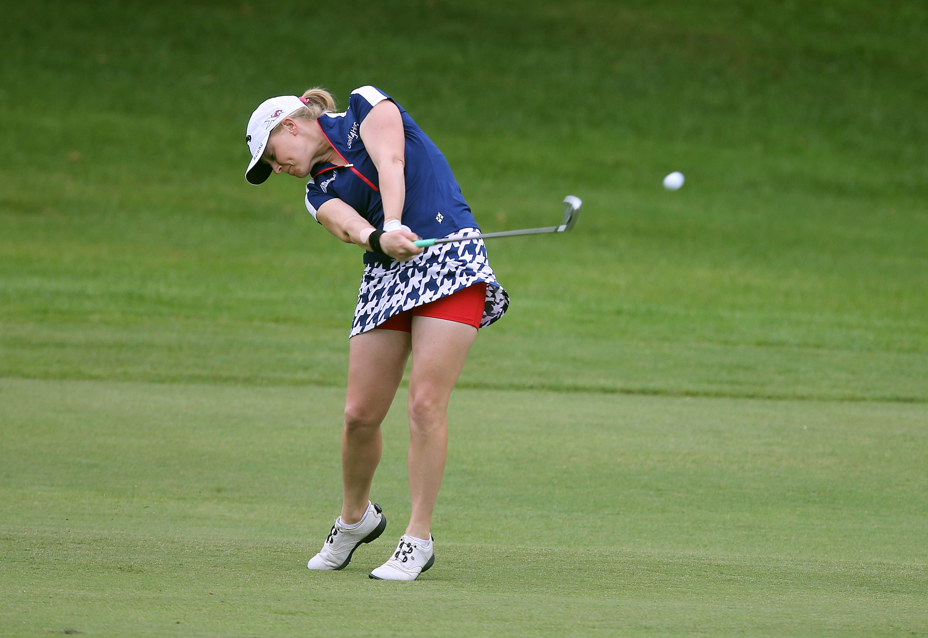 LPGA Tour Short skirts are out, collars are in image