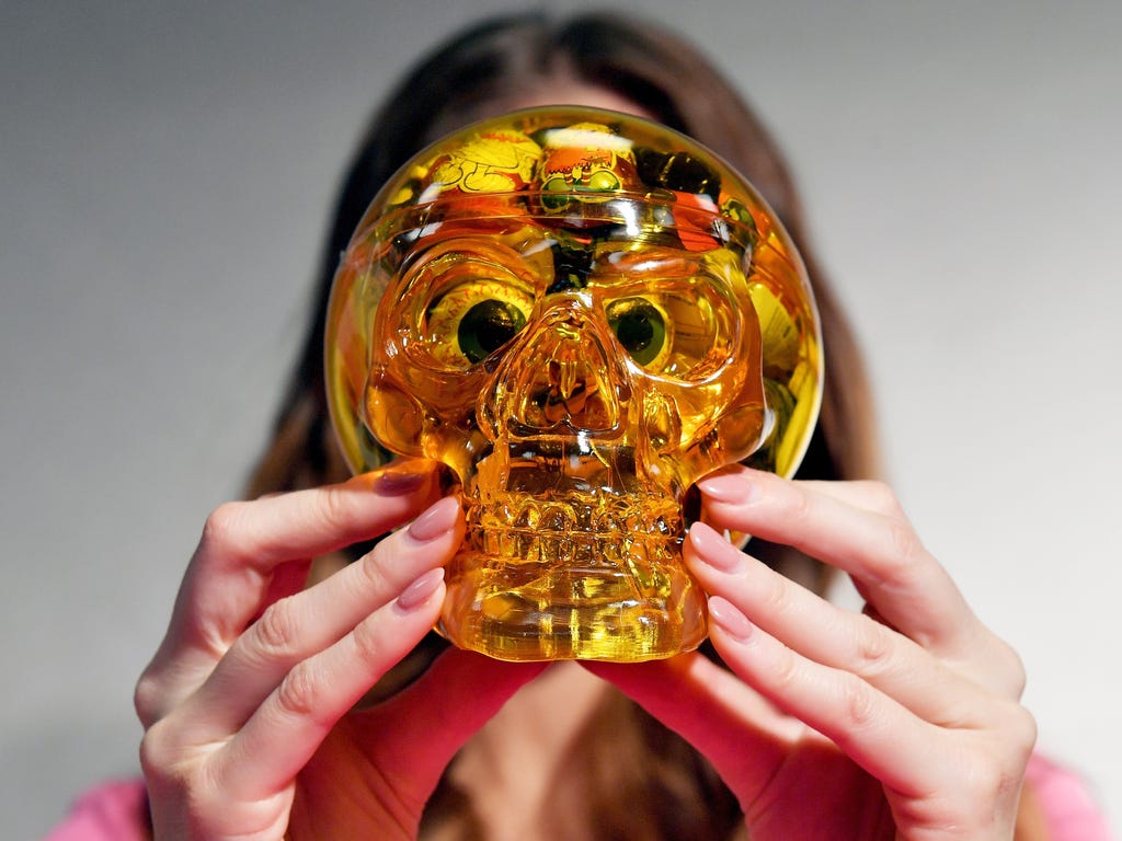 A model shows a golden skull full of sweets at the ISM sweets fair in Cologne, Germany. The world's largest trade and supplier fair for sweets and snacks runs from Jan. 28-31.