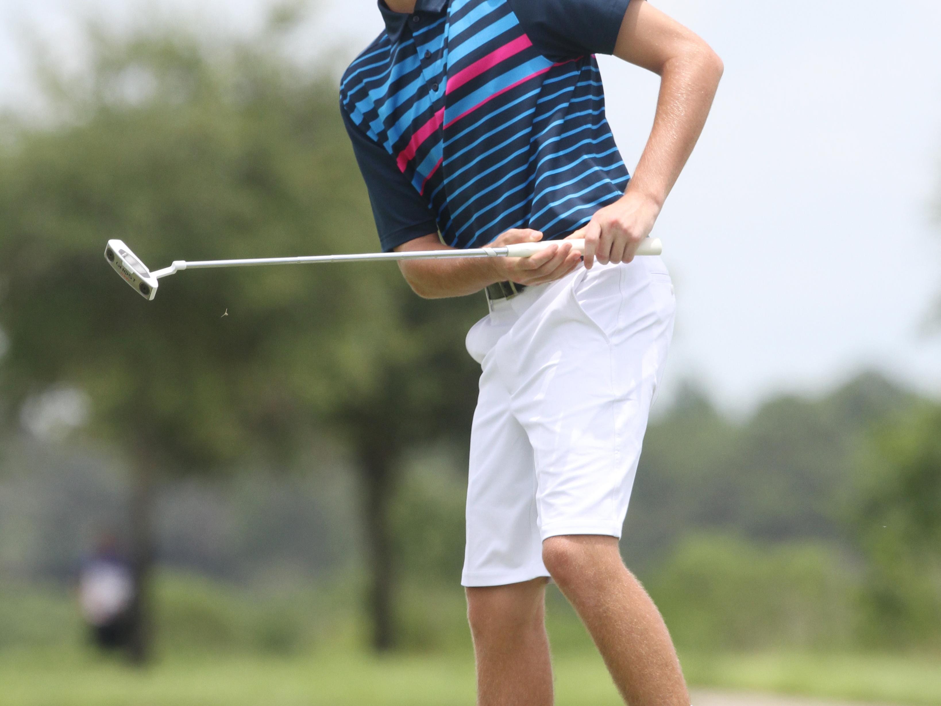 Eric Grimes reacts after just missing a birdie putt on the 9th hole while competing in the Nolan Henke-Patty Berg Junior Masters at River Hall Country Club on Thursday.
