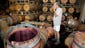 Winemaker Tom Montgomery stands in spilled wine to inspect the damage at the B.R. Cohn Winery barrel storage facility following and early morning earthquake in Napa, California on Aug. 24.