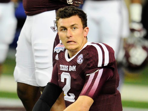 Texas A&M Aggies quarterback Johnny Manziel (2) grimaces prior to facing the Duke Blue Devils in the 2013 Chick-fil-a Bowl at the Georgia Dome.
