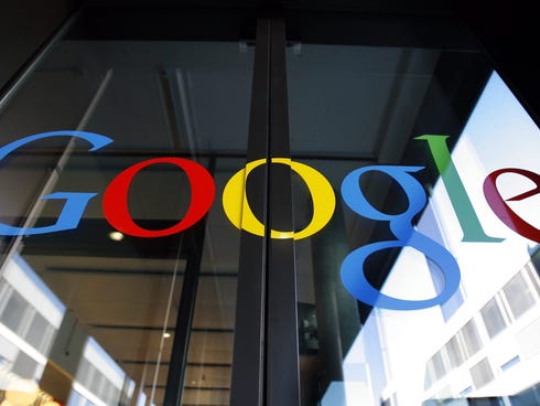 The Google logo is seen on the front door of a Google Engineering center in Zurich, Switzerland.