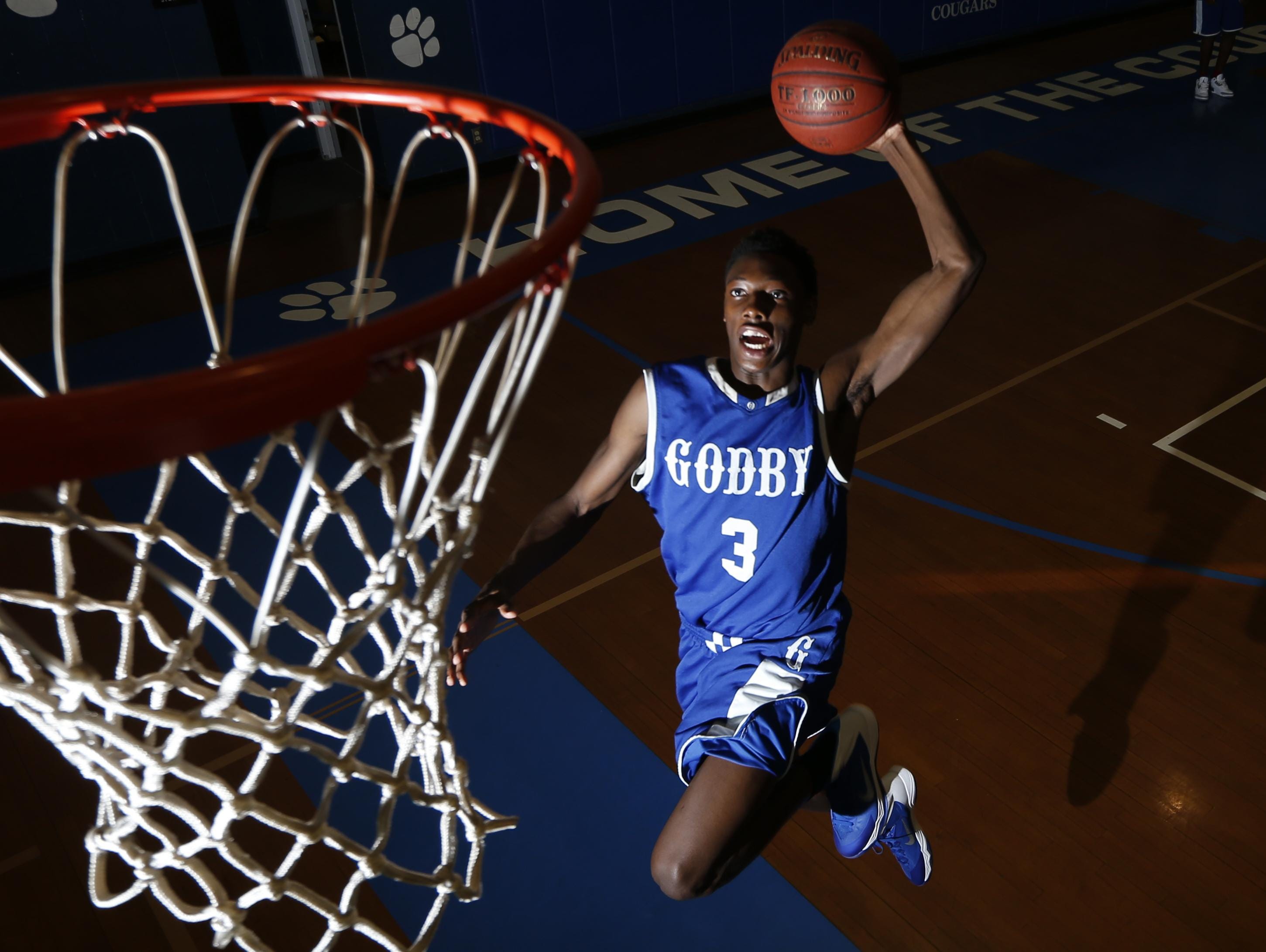 Godby senior Quan Jackson averaged 13 points per game to help the top-ranked and undefeated Cougars (31-0) win the Class 4A state title. He was named the 2015 All-Big Bend Co-Player of the Year.