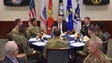 President Trump has lunch with troops during a visit
