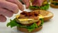 Brian Kolodziej, Senior Manager of Culinary for Chick-fil-A, makes the company's new grilled chicken club sandwich.