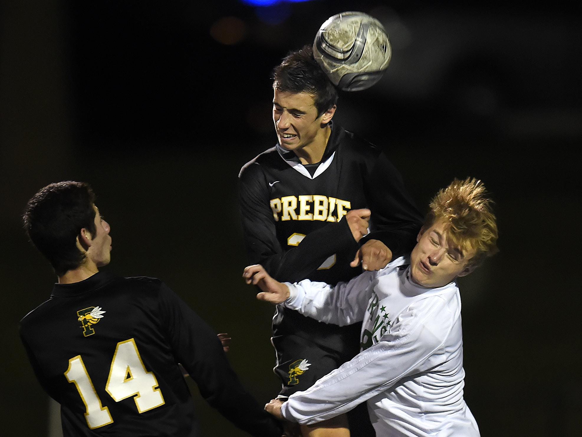 Green Bay Preble’s Isaac Putzier, middle, was named the FRCC’s offensive player of the year.