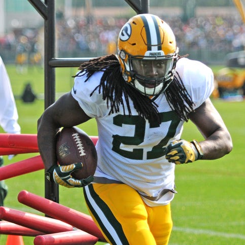 Packers running back Eddie Lacy runs through drills during Thursday's training camp practice at Ray Nitschke Field.