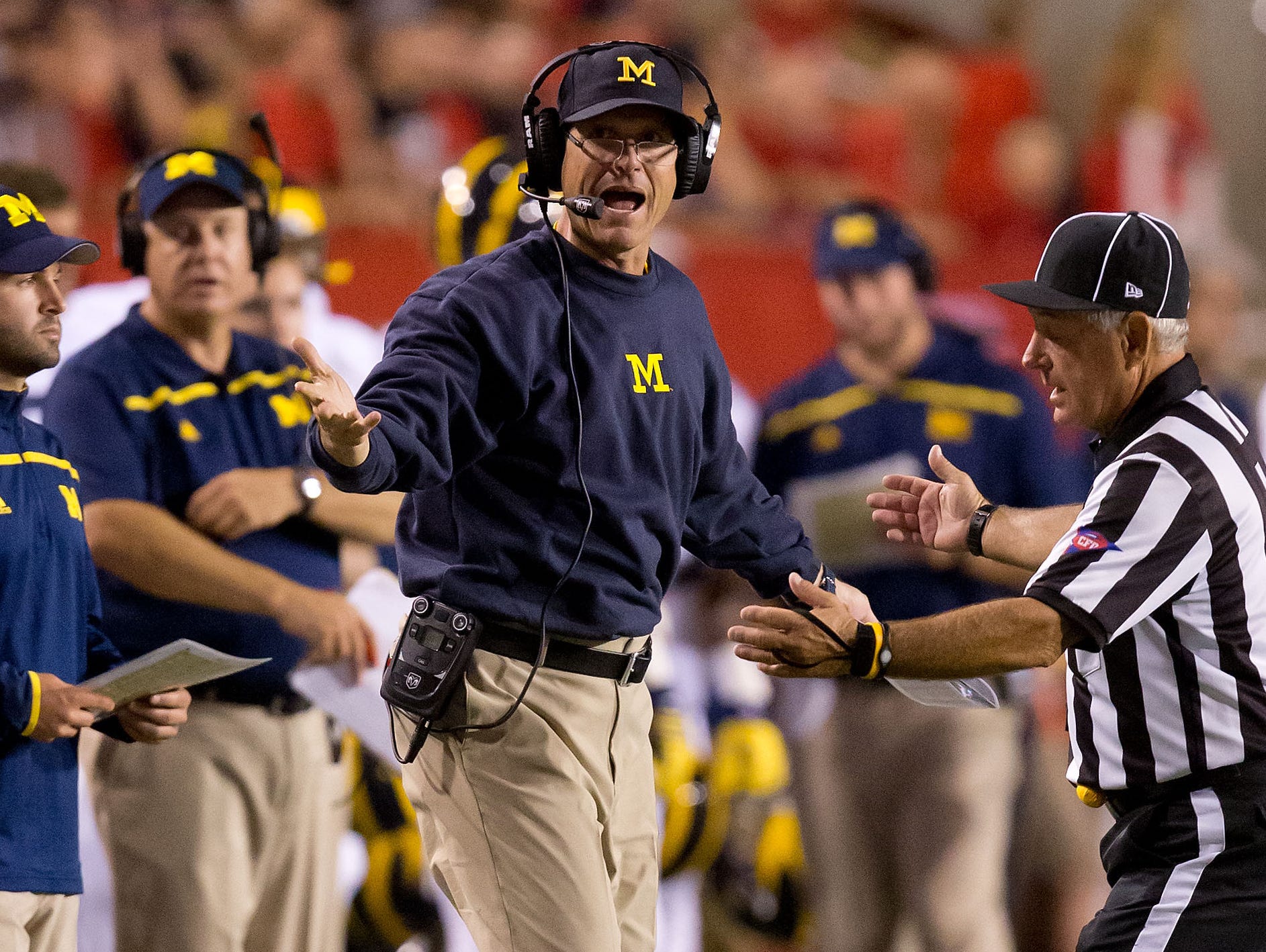 Michigan fell in Jim Harbaugh's return to the Wolverines sidelines Thursday night.