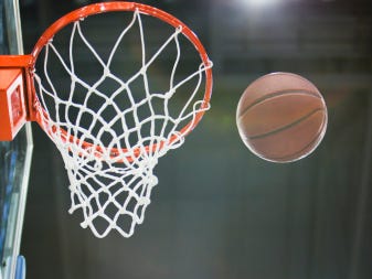 Olivet High School's Colin Grady made an 80-foot basket Feb. 10.
