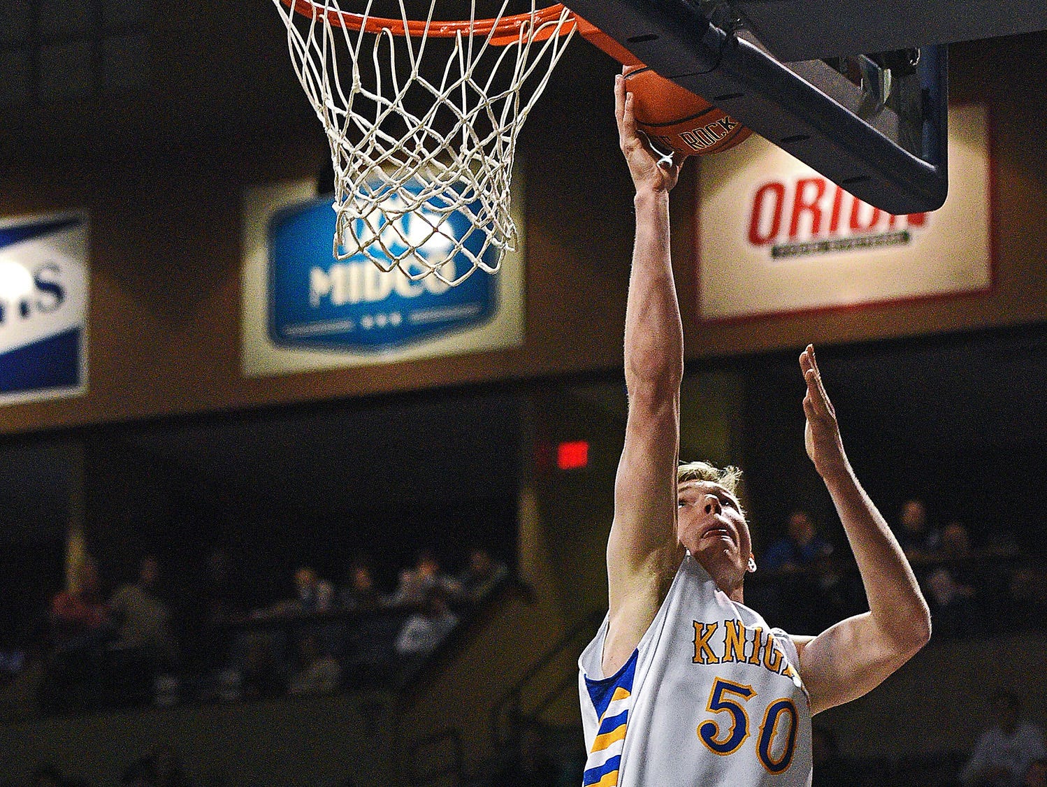 O'Gorman's JP Costello (50) goes up for a shot during the Gary Munsen Tournament Championship game against IMG Academy Friday, Dec. 30, 2016, at the Sanford Pentagon in Sioux Falls.