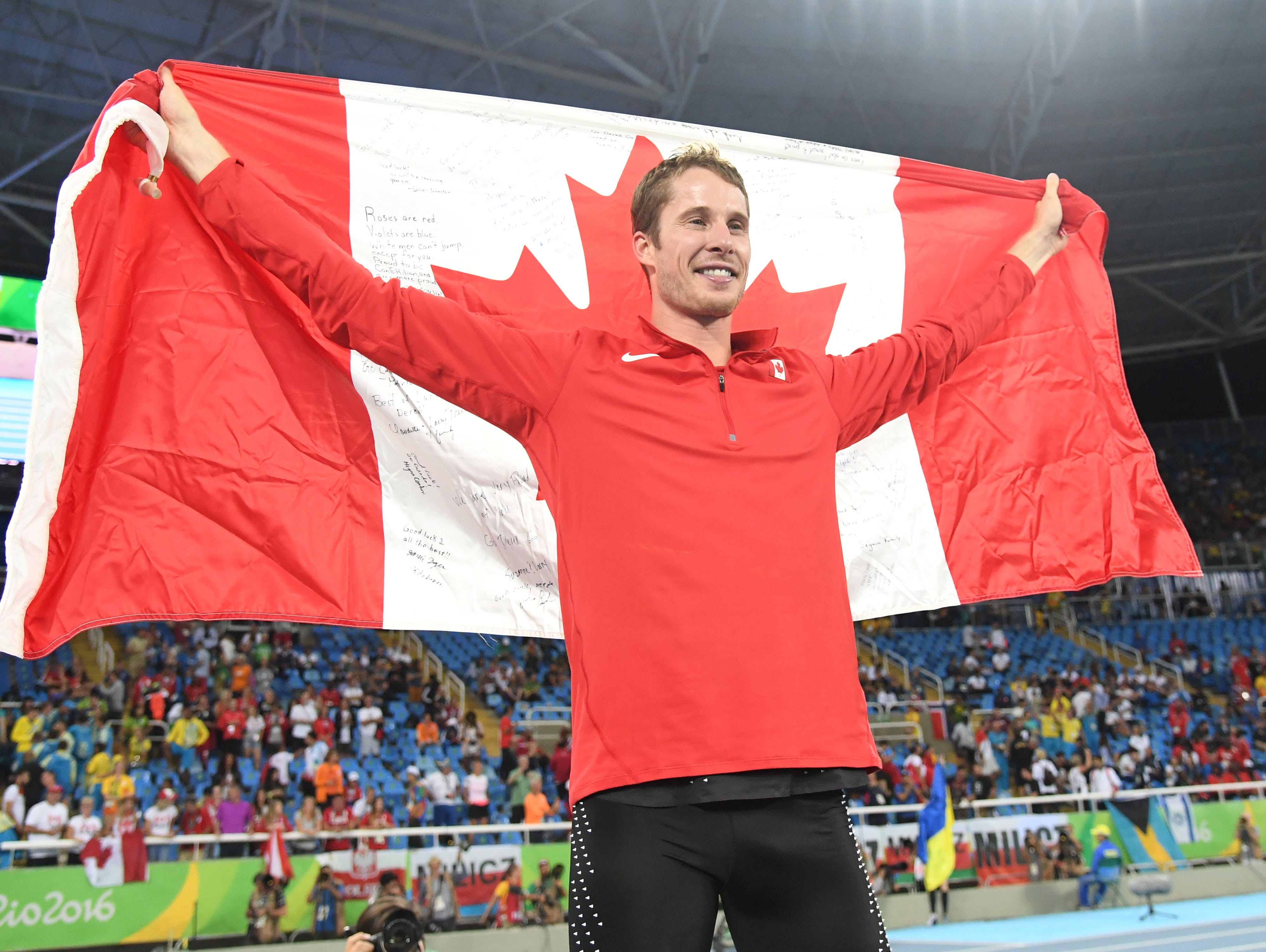 Derek Drouin (CAN) wins gold during the men's high jump final in track and field competition in the Rio 2016 Summer Olympic Games at Estadio Olimpico Joao Havelange.