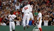 July 26: David Ortiz celebrates with teammates after