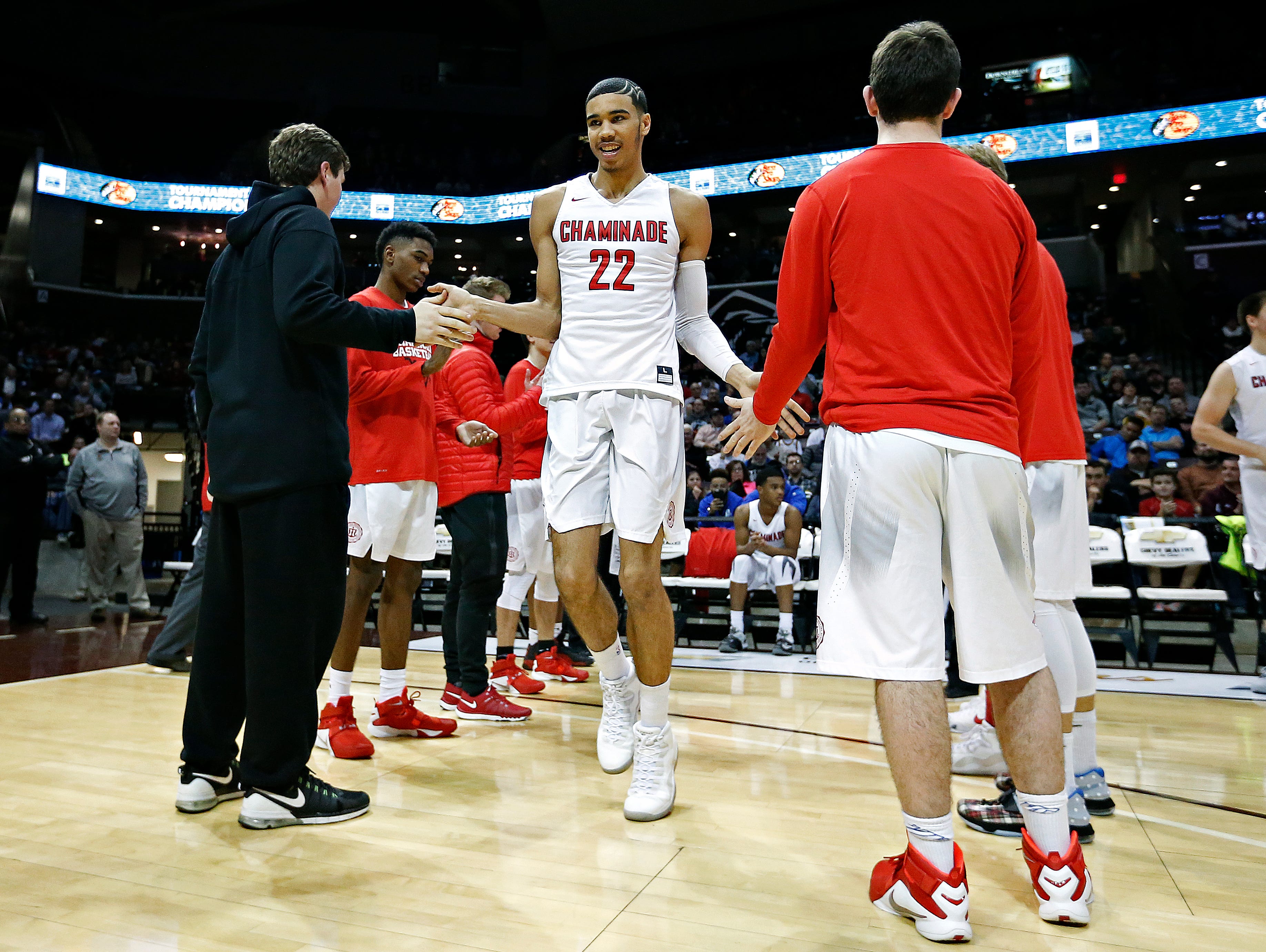 Chaminade College Preparatory School forward Jayson Tatum (22) enter the court prior to the start of the 2016 Tournament of Champions first round game between Chaminade College Preparatory School (St. Louis, Mo.) and Christ The King High School (Middle Village, N.Y.) at JQH Arena in Springfield, Mo. on Jan. 14, 2015. The Chaminade Red Devils won the game 67-48.