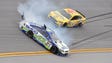 Casey Mears (13) spins out and wrecks in front of Brian