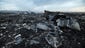 Debris is scattered in a field in Ukraine.