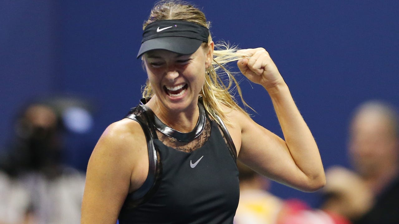 Sharapova upsets Halep in Grand Slam return
