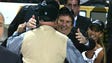 In 2002, Wings coach Scotty Bowman hugs Mike Ilitch