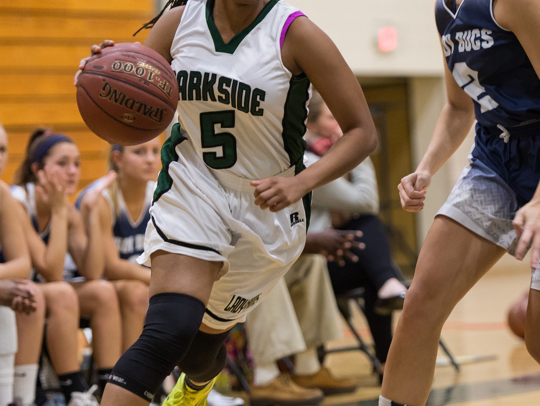 Parkside's T. Jackson (5) drives the ball towards the net.