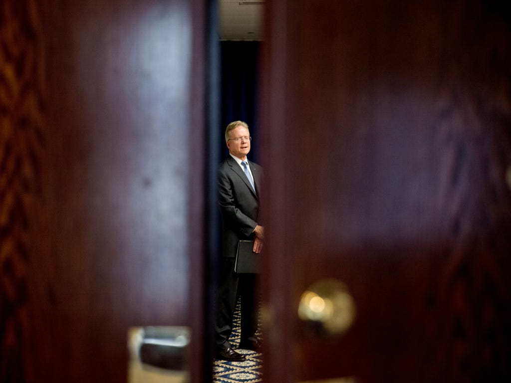 Former Virginia senator Jim Webb waits in a side room before announcing he will drop out of the Democratic race for president  at the National Press Club in Washington.