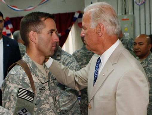 U.S. Vice President Joe Biden, right, talks with his