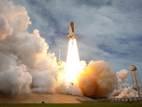 Space shuttle Atlantis launches from pad 39A on Friday,